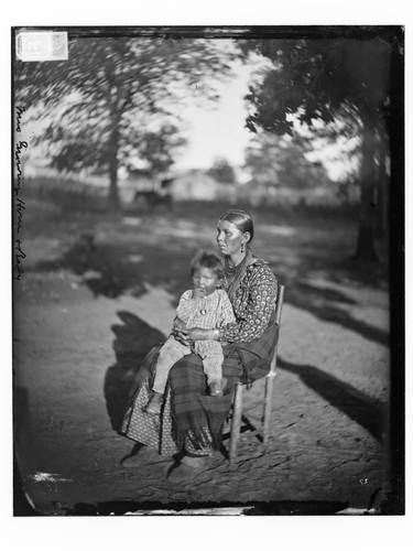 Mrs. Growing Horn and small child (Sac & Fox), Oklahoma Territory