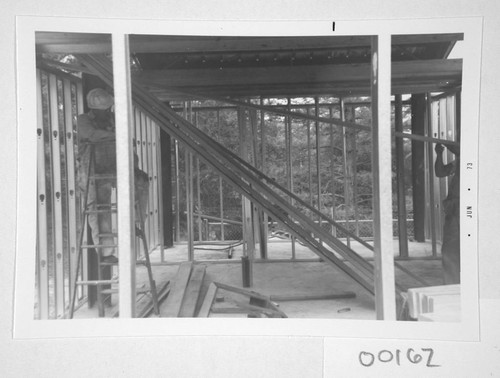 Construction and framing of a computer room addition at the base of the 150-foot tower telescope, Mount Wilson Observatory