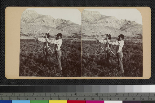 Hualapai Indian boys with bow and arrows