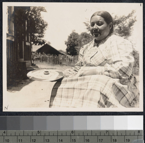 Mary Benson (Pomo) and her fine basket