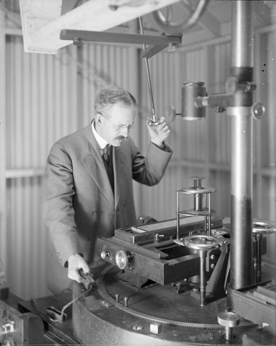 George Ellery Hale at the spectrograph of the 60-foot solar tower telescope, Mount Wilson Observatory