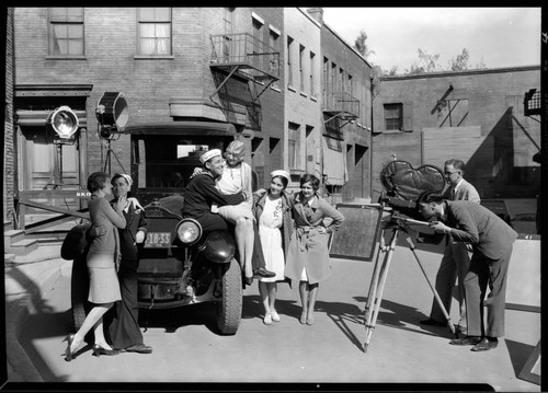 Sailors and women around a Richfield Oil truck at RKO pictures. 1929