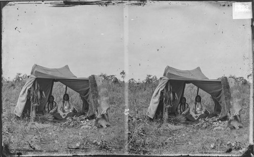 Cheyenne Chief Whirlwind and wife in temporary camp during the annual Grand Council, Okmulgee, Oklahoma, 1874