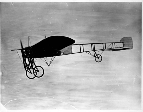 Louis Paulhan flying his monoplane (Bleriot)