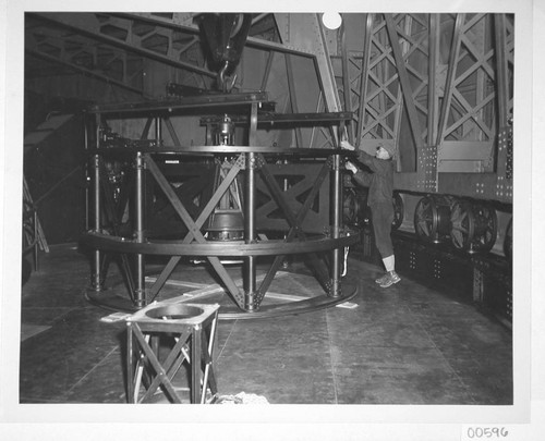 Attaching the cassegrain cage to a crane, to attached it to the Hooker 100-inch telescope, Mount Wilson Observatory