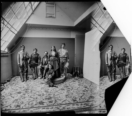 Modoc Indians and others in photographer's studio. Left to right ...