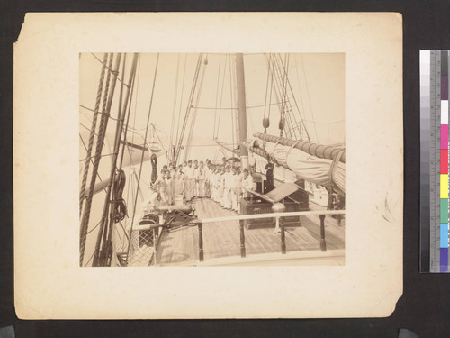 Crew on deck of unknown ship