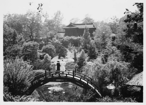 Drum bridge and house in the Japanese garden, circa 1925