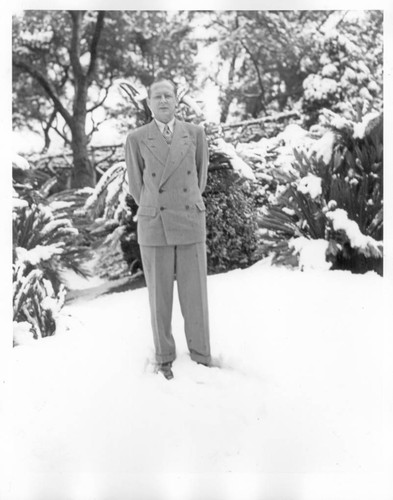 Irwin Morrkisch on the grounds after snowfall, January 11, 1949