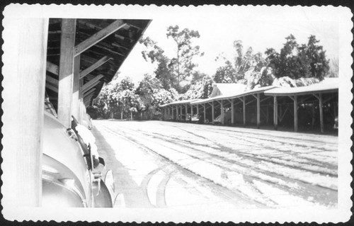 Covered parking at the San Marino Ranch after snowfall, February 1948