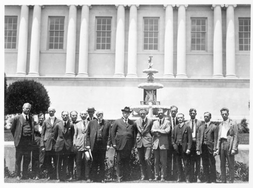 Group photo of Huntington staff with Henry E. Huntington in center, circa 1921