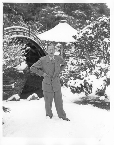 Irwin Morrkisch in the Japanese garden after snowfall, January 11, 1949