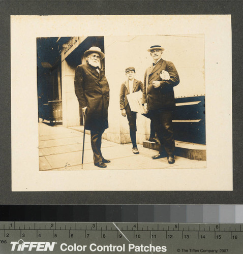 Henry E. and Collis P. Huntington and a paperboy, circa 1892