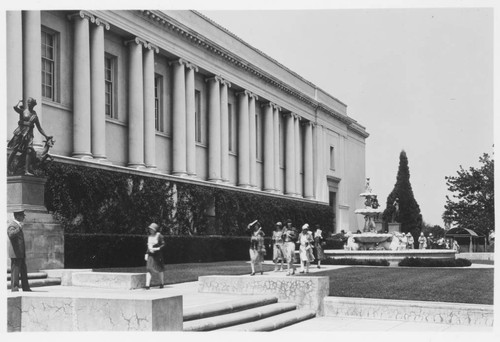 Library building with guard and visitors, circa 1930