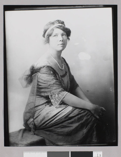 Portrait of Charmian London with necklace and headband