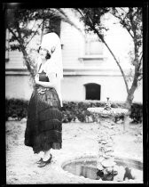 Fiesta de las Rosas Woman by Fountain