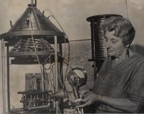 Constance Perham with Westinghouse lamp and Herrold broadcasting artifacts, 1972