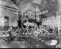 Interior of a church decorated for Easter, c. 1912