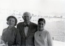 Lee and Marie de Forest with young woman in front of water