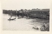 Canoeists approaching Lagunita boathouse, Stanford University, ca 1911-1916