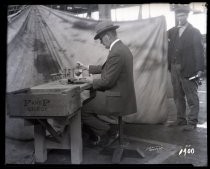 Demonstrating fruit cutting equipment