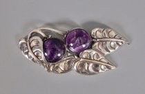 Silver and amethyst brooch