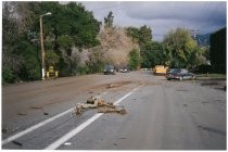 Road covered with flood debris