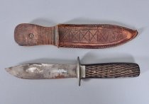 Hunting knife with leather sheath