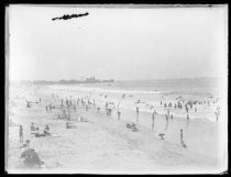 Beach scene, with boardwalk in background