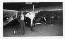 Willis Riker with small engine airplane