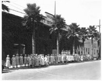 Cannery worker group portrait in front of Hunt Brothers Packing Company