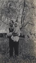 Tommy Nishihara with child