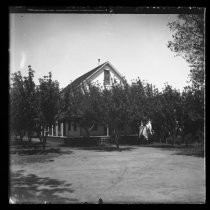 Farmhouse set amongst trees