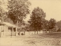 Gate leading to works, Hacienda