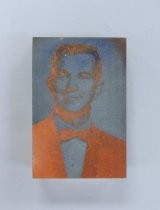 Man in a bow tie printing block