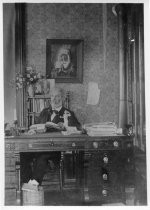 Charles Edwin Markham at desk