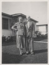 Lee de Forest with unidentified woman in front of white stucco house