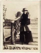 Woman on arched bridge