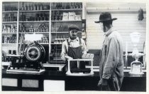 C. R. Bachman and Carl Nelson in Holy City general store