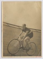 Percy Smith riding on velodrome