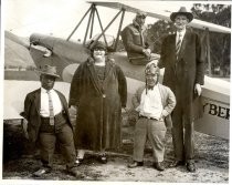 Group portrait with bi-plane