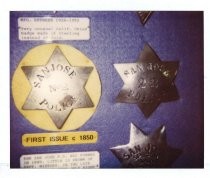 Police badges in the San Jose Police Department History Center