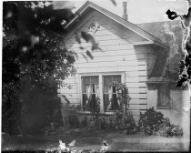 Exterior view of windows in white house, c. 1912