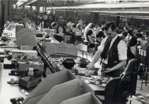 Men assembling radios, Motorola factory