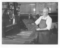 F. Chester Davis holding a Tenaplate mold