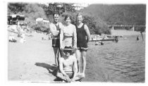 Group of men and women swimming