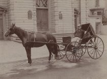 Horse-drawn carriage in front of First Methodist Church