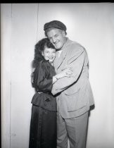 Wrestler Big Ike Eakins with woman