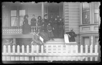 Family portrait on front steps of house