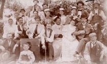 Group portrait of musicians in outdoor setting, c. 1890